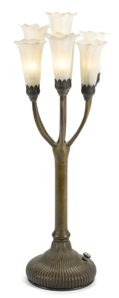A Tiffany Studios Favrile glass and patinated bronze seven light lily lamp by Tiffany Studios