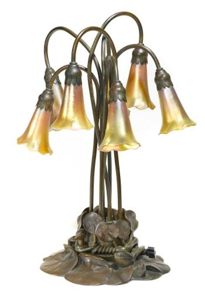 A Tiffany Studios Favrile glass and patinated bronze seven light Lily lamp by Tiffany Studios