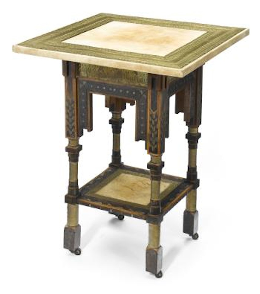 A Carlo Bugatti ebonized wood, pewter and copper inlaid, hammered brass overlaid and parchment side table by Carlo Bugatti