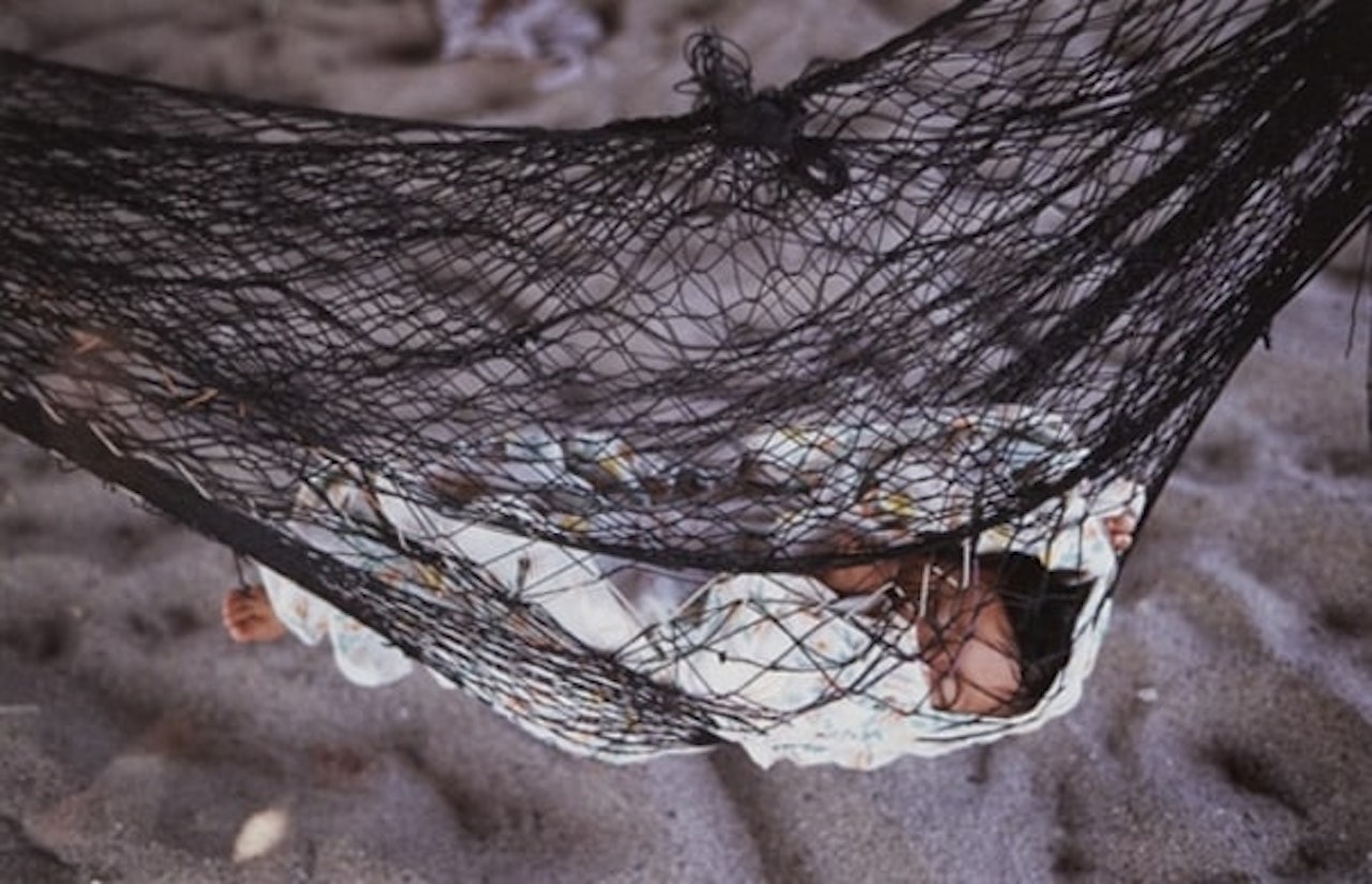 Girl in a hammock by Gabriel Orozco