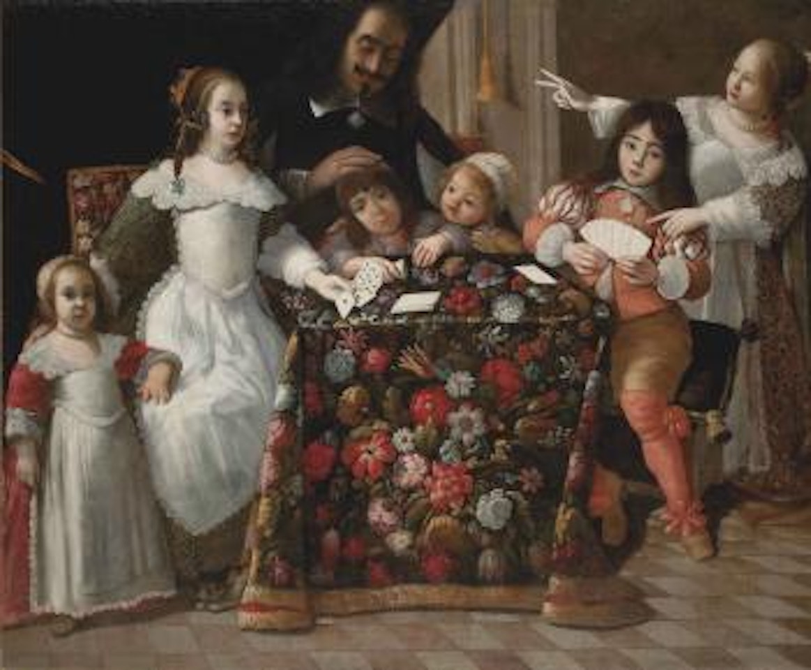 Portrait of a family playing cards in an interior by Italian School