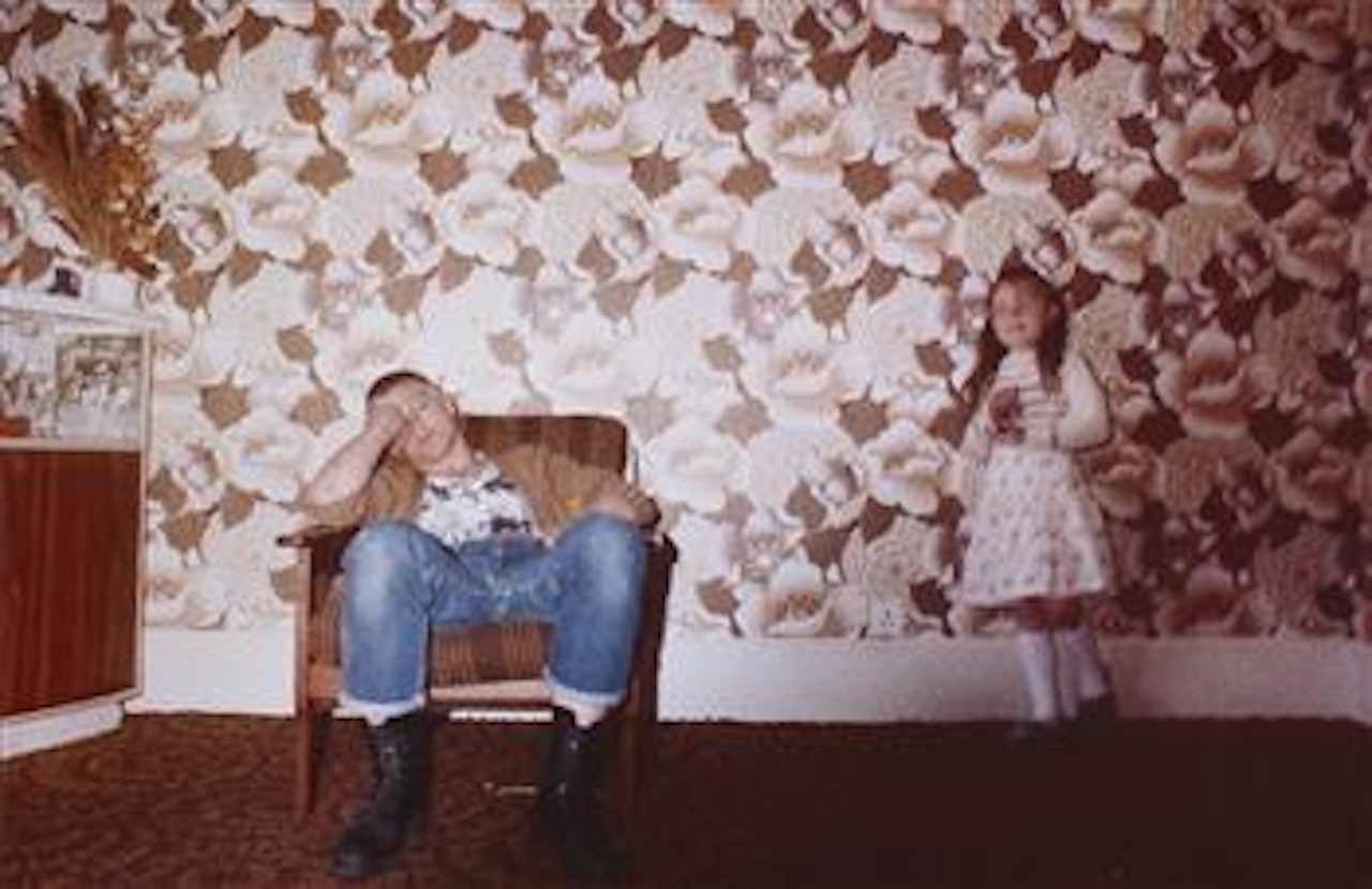 Skinhead with child, London by Nan Goldin