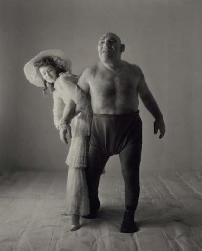 The wrestler, the angel with professional model, Dorian Leigh by Irving Penn