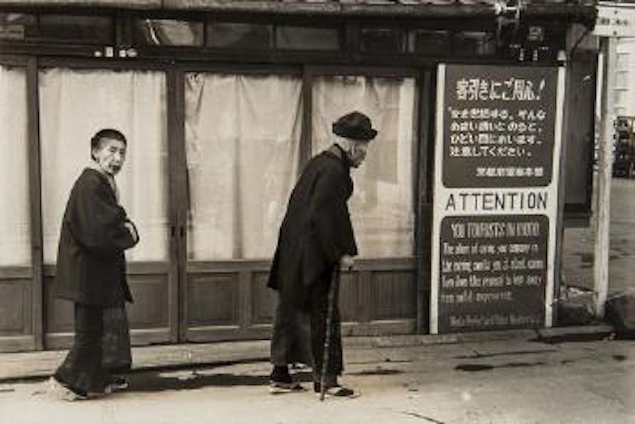 Street-corner scene near the Gion district, Kyoto, Japan by Henri Cartier-Bresson