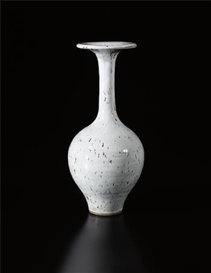 Tall vase with flaring lip by Lucie Rie
