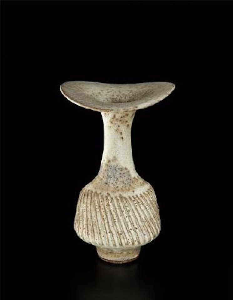Vase with flaring lip and diagonally fluted body by Lucie Rie