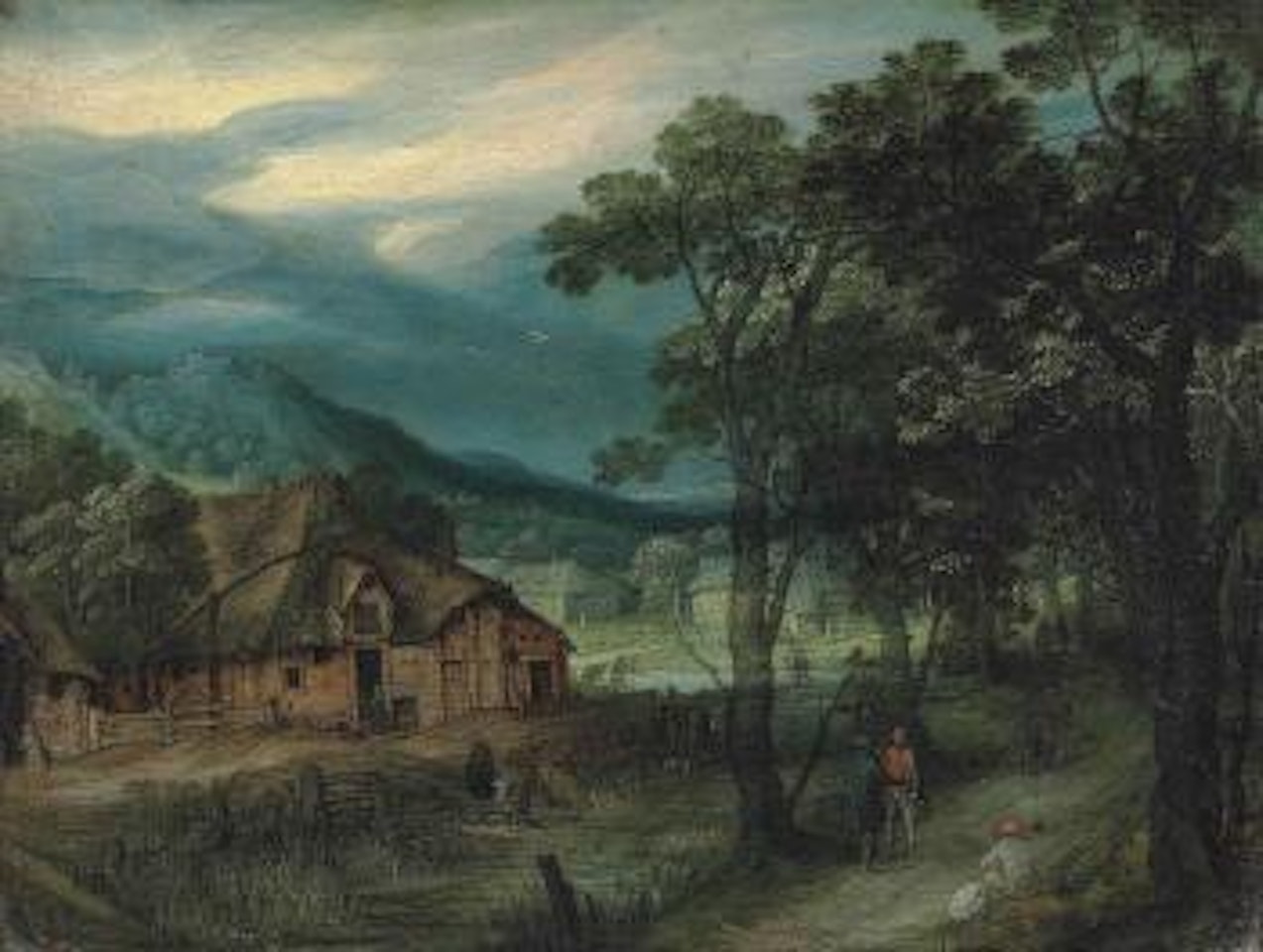 A wooded landscape with travellers on a track by a village by Adriaen van Stalbemt