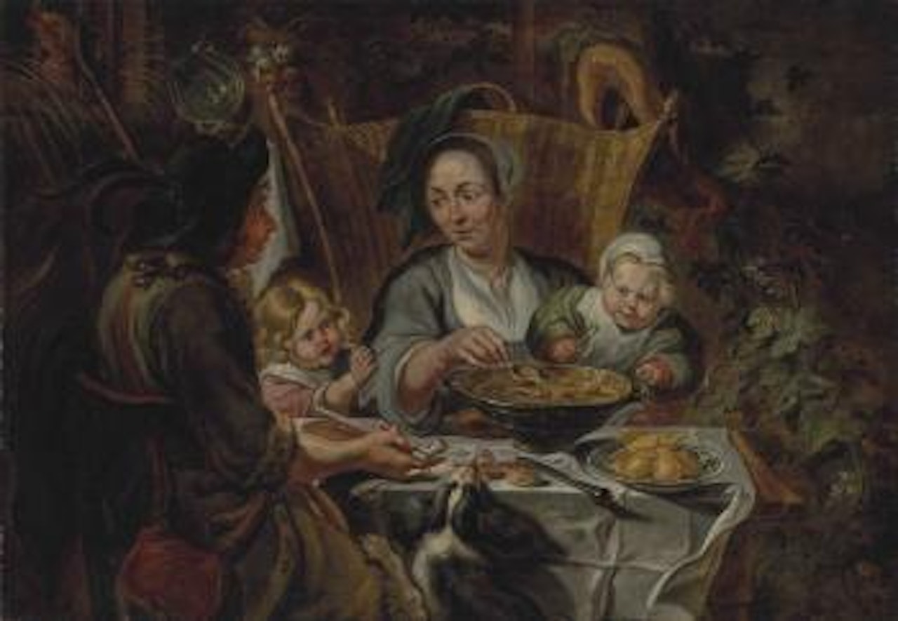 A family gathered around a table sharing a meal by Jacob Jordaens