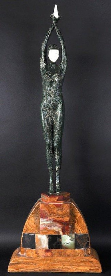 The snake dancer by Demetre Chiparus