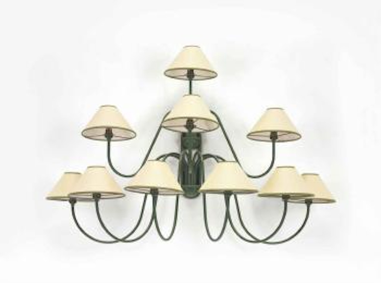 A ten-light Bouquet sconce by Jean Royere