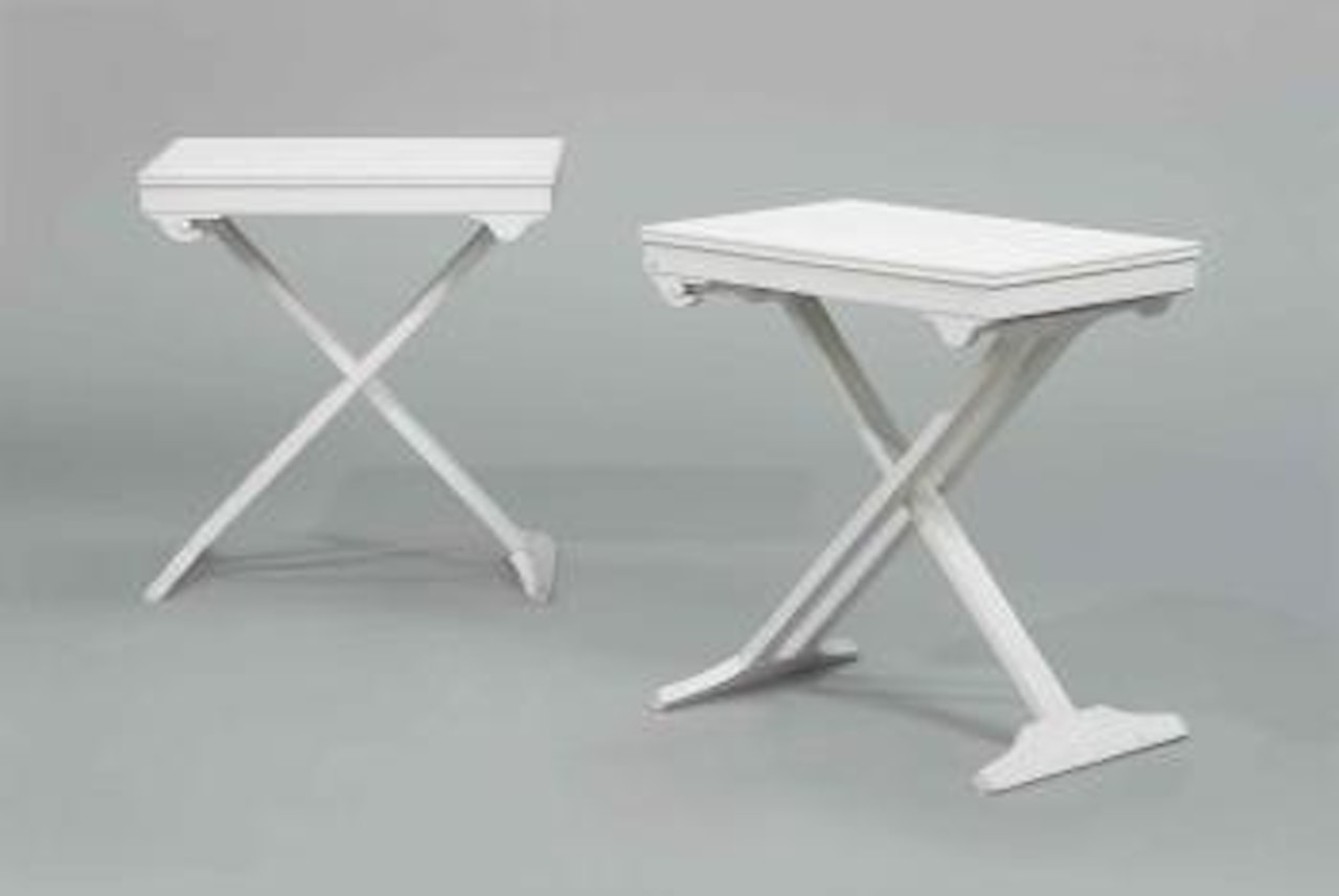 A pair of folding tables by Jean-Michel Frank