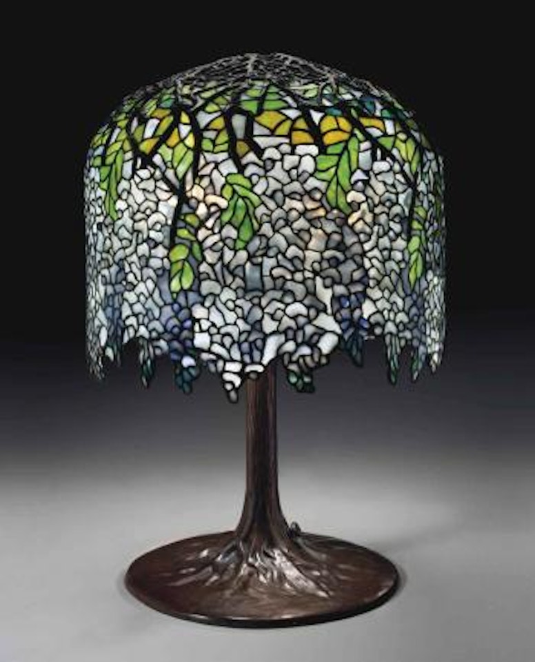 A Wisteria table lamp by Tiffany Studios