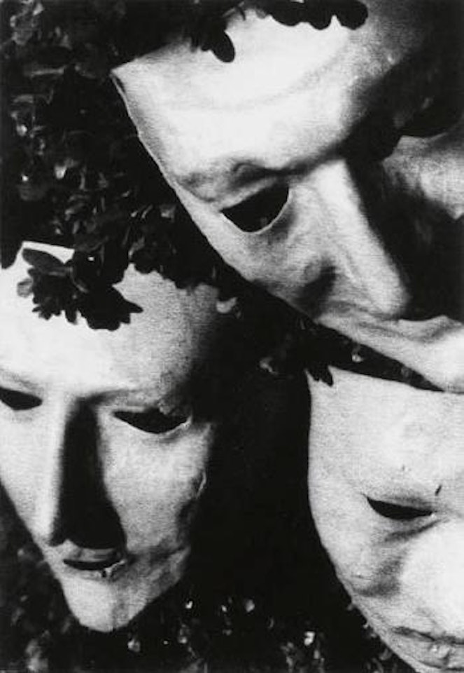 Juliet and friends in papier-maché masks, Hollywood by Man Ray