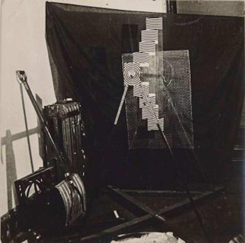 Duchamp's studio, New York (Rotary Glass Plates (Precision Optic) & In Advance with the Broken Arm) or Stereopticon by Marcel Duchamp by Man Ray
