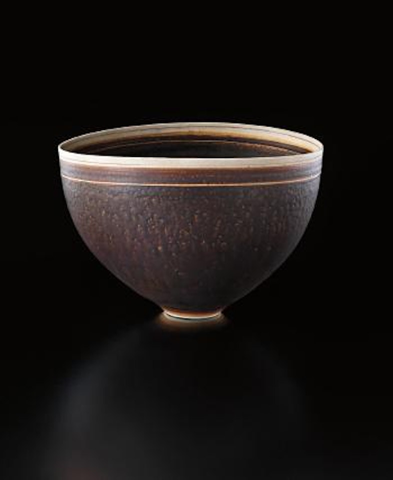 Deep bowl with oval lip by Lucie Rie