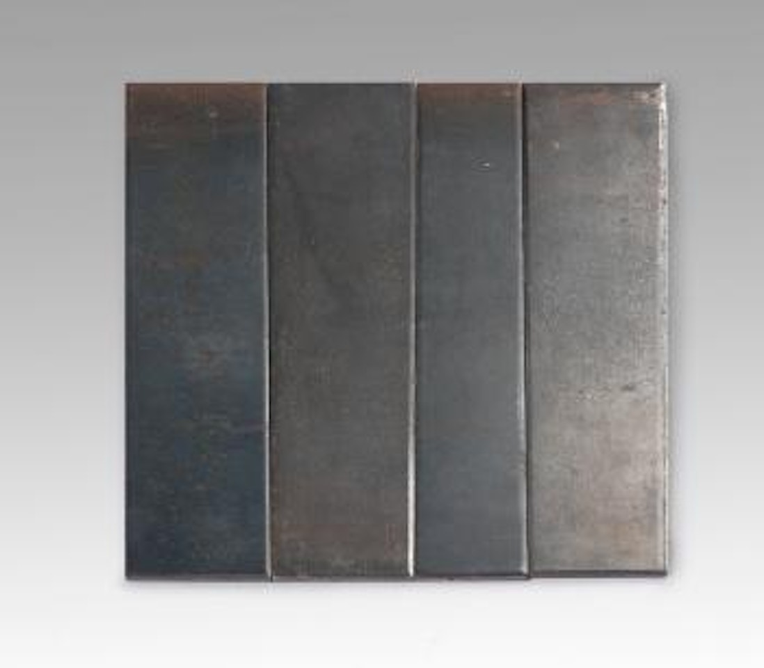 Irregular rectangle composed of 4 unequal parts by Carl Andre