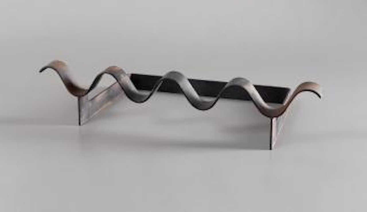'Ondulation' andiron by Jean Royere