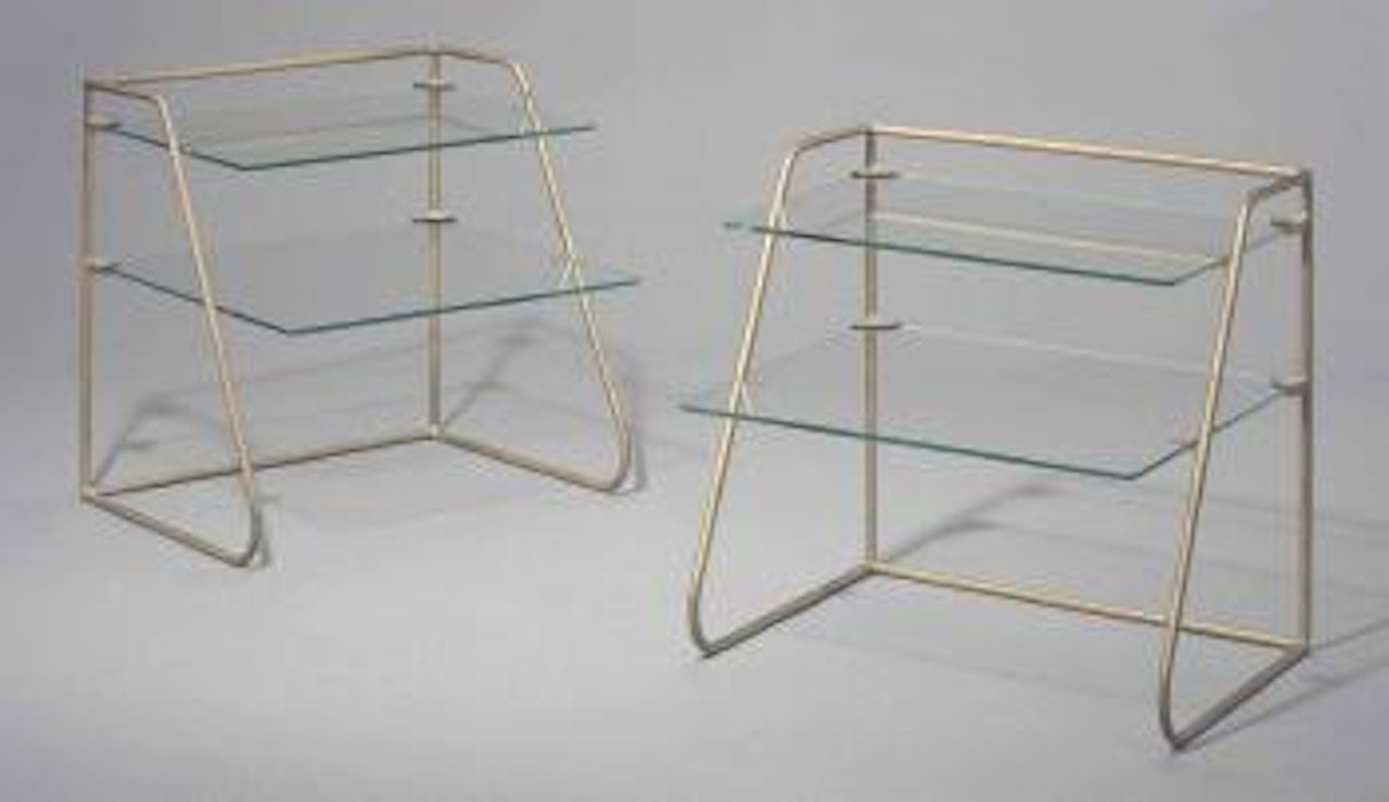 A Pair Of Side Tables by Jean Royere