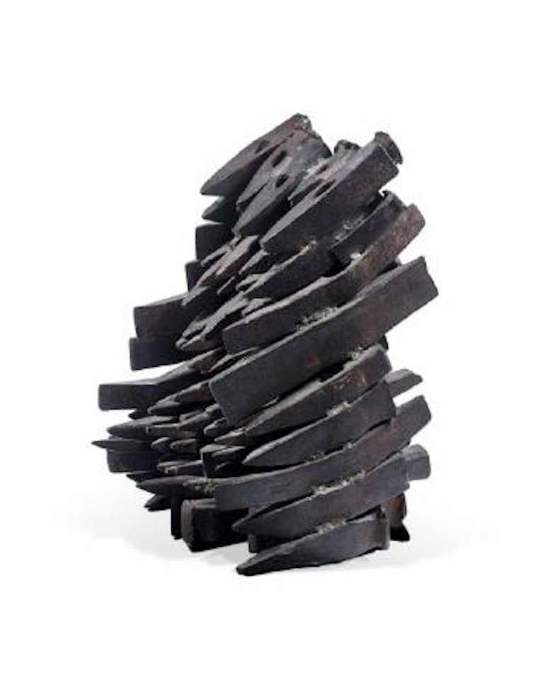 Le torpilleur (accumulation de cognées) by Arman