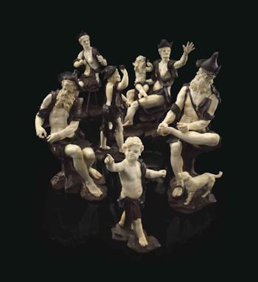A Group Of Six Carved Ivory And Walnut Figures Of Beggars by Simon Troger