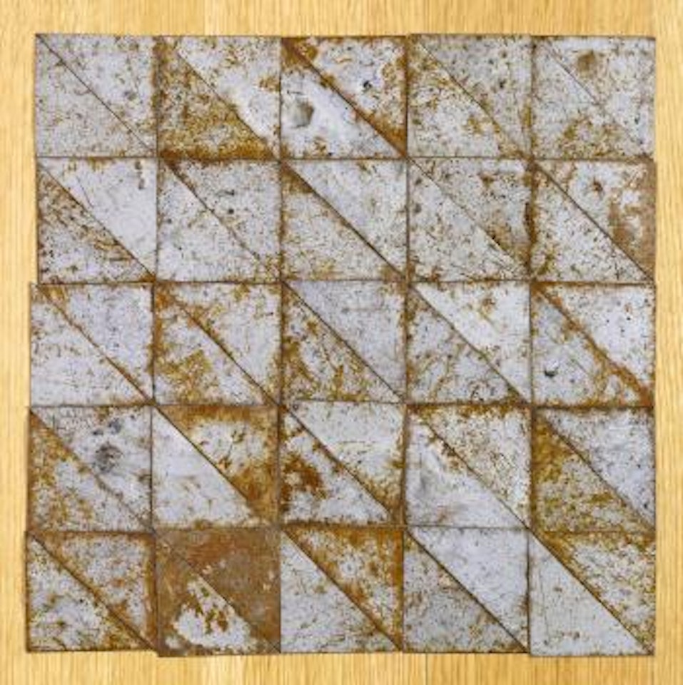 50 triangles forming a square by Carl Andre