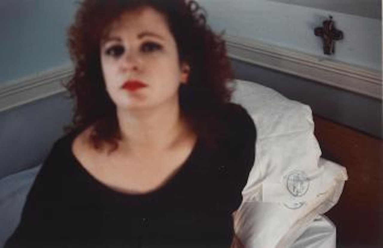 Self portrait in the Lodge, Belmont MA, 1988 by Nan Goldin