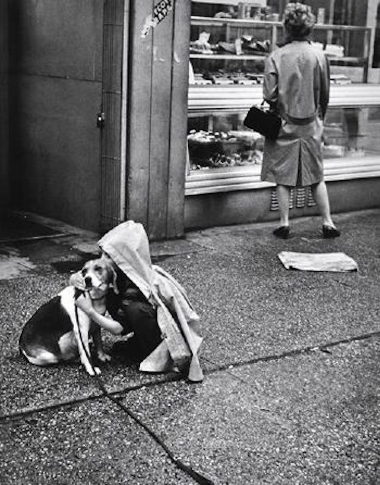 Untitled (Child with dog) by André Kertész
