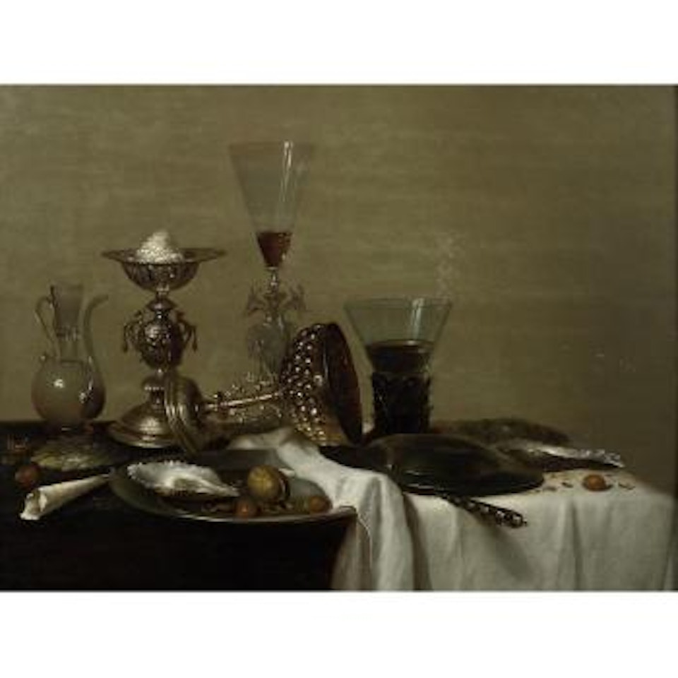 A silver cup with a roemer of white wine and a glass jug on a draped table with a pewter dish of oysters and nuts by Willem Claesz Heda