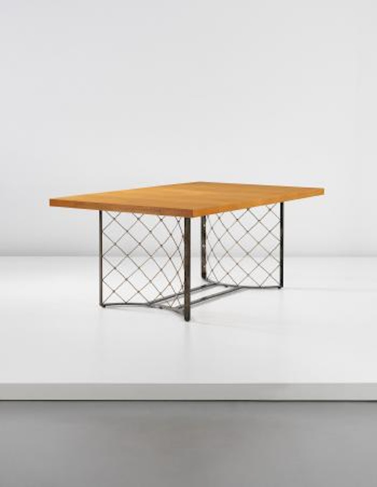 Important and unique ‘Tour Eiffel' extendable dining table by Jean Royere