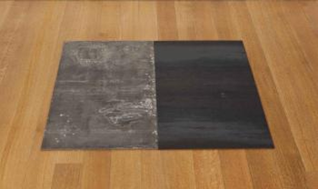 Zinc-steel Dipole (E/W) by Carl Andre