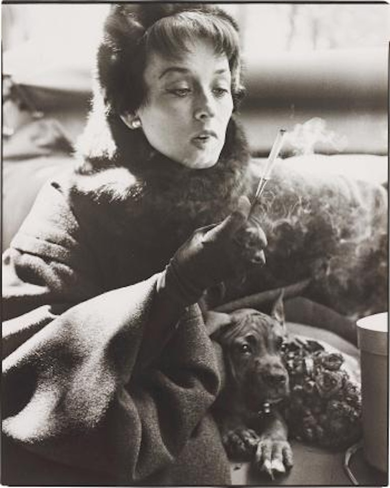 Dorian Leigh, coat by Dior, Avenue Montaigne, Paris, August, 1949 by Richard Avedon