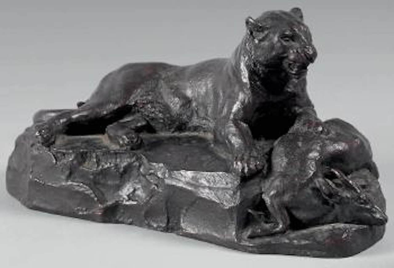 Panthère couchée tenant un cerf Muntjac by Antoine-Louis Barye