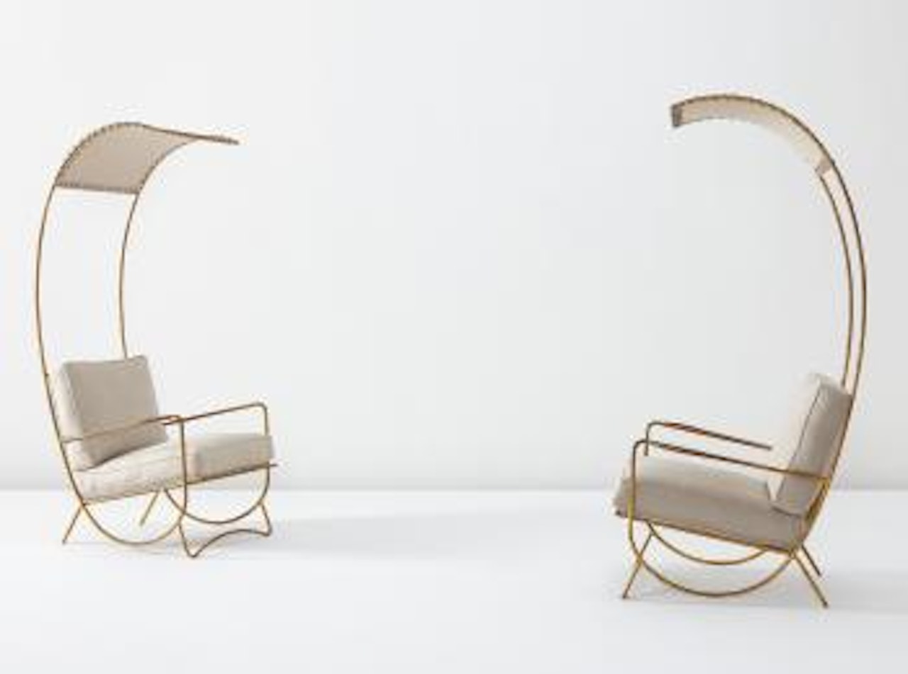 Canopy lounge chairs by Jean Royere