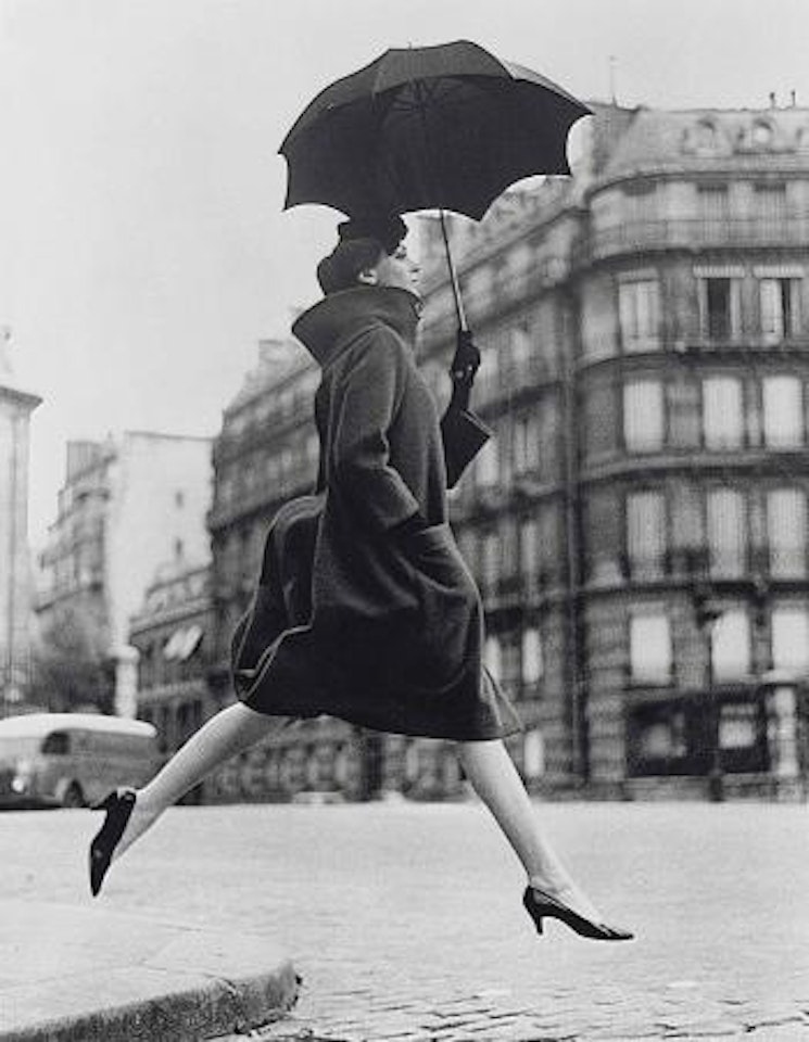 Carmen, Homage to Munkácsi, Coat by Cardin, Place François 1er, Paris, August by Richard Avedon