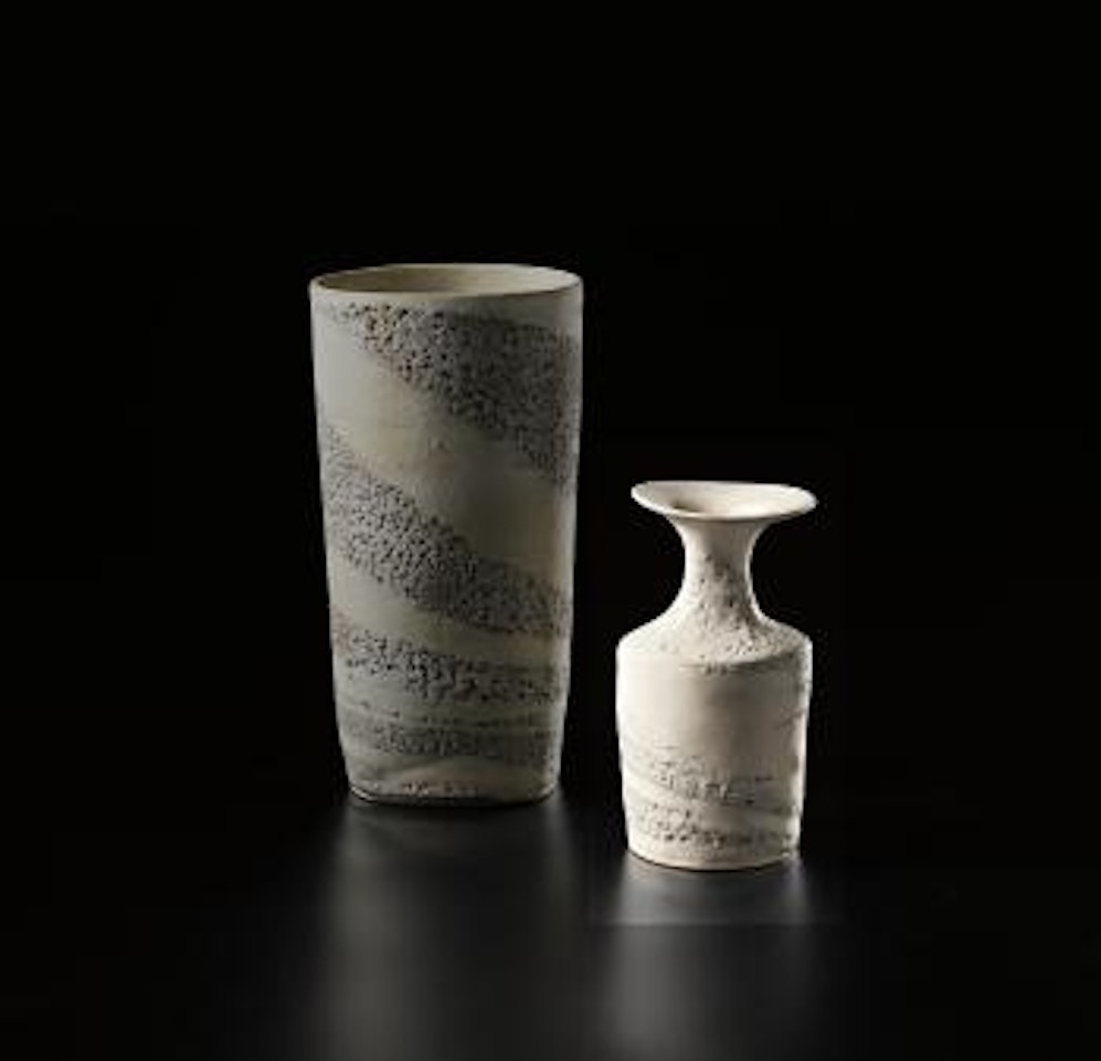 Vase with flaring lip and integral blue and white spiral by Lucie Rie