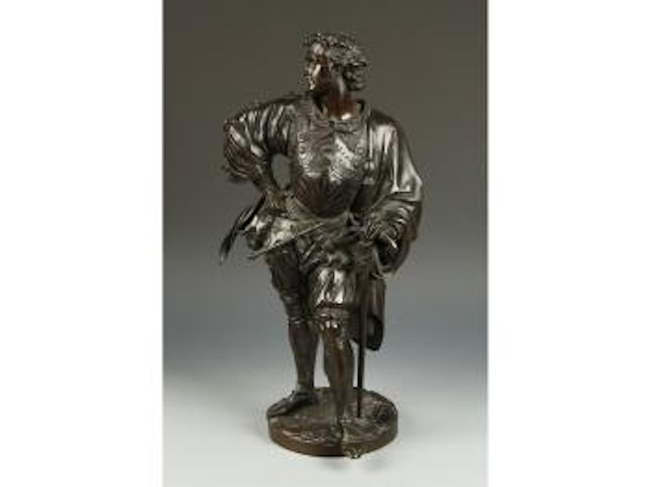 A gentlemen in antique Spanish dress by Albert-Ernest Carrier-Belleuse