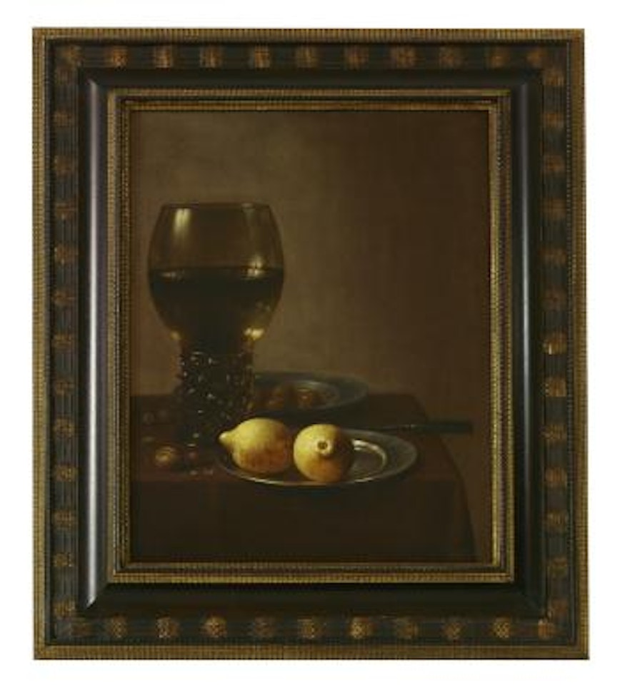 A Still Life of a Roehmer, a Plate of Lemons, a dish of Olives, Nuts and a Knife on a Draped table by Willem Claesz Heda