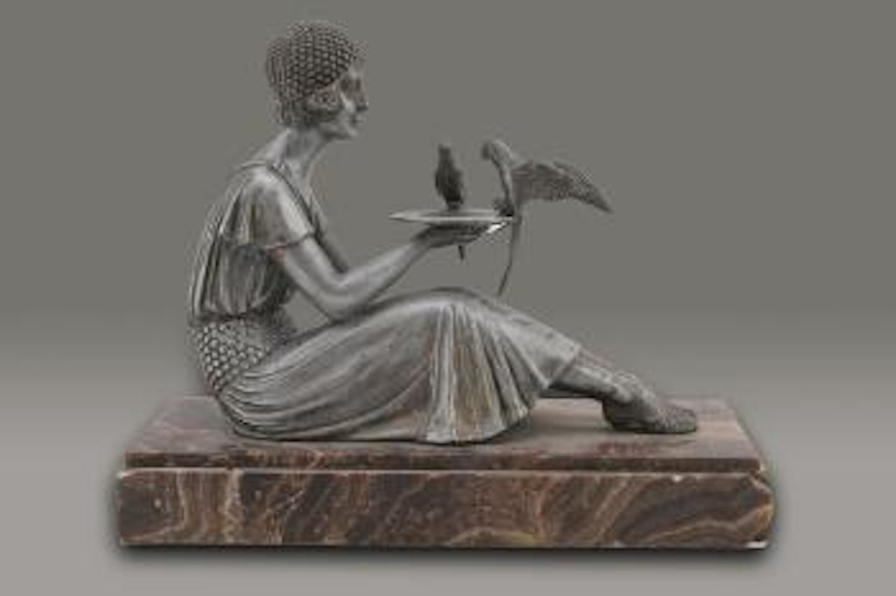 Jeune femme nourrisant deux perroquets by Demetre Chiparus