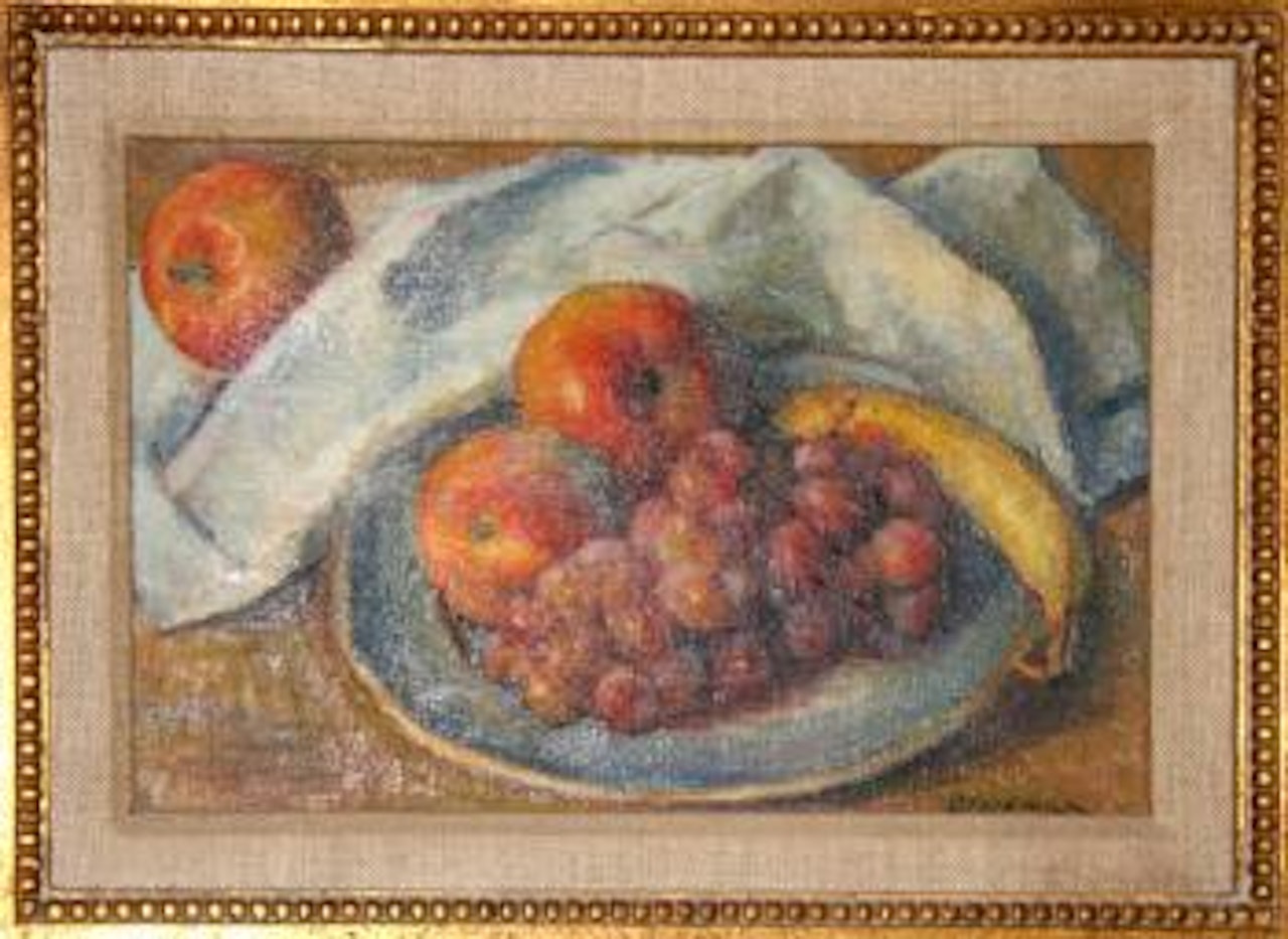 A plate of fruit by Robert Brackman