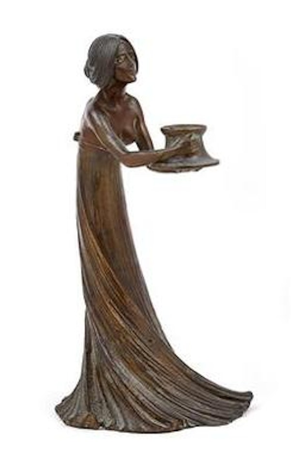 A figural candleholder by Gustav Gurschner