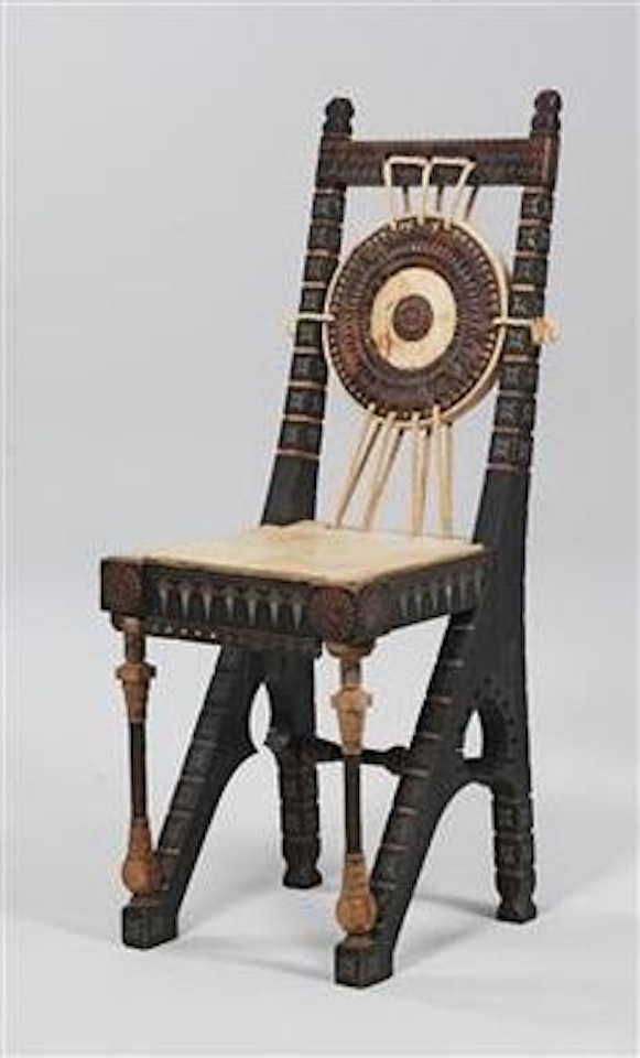 A chair by Carlo Bugatti