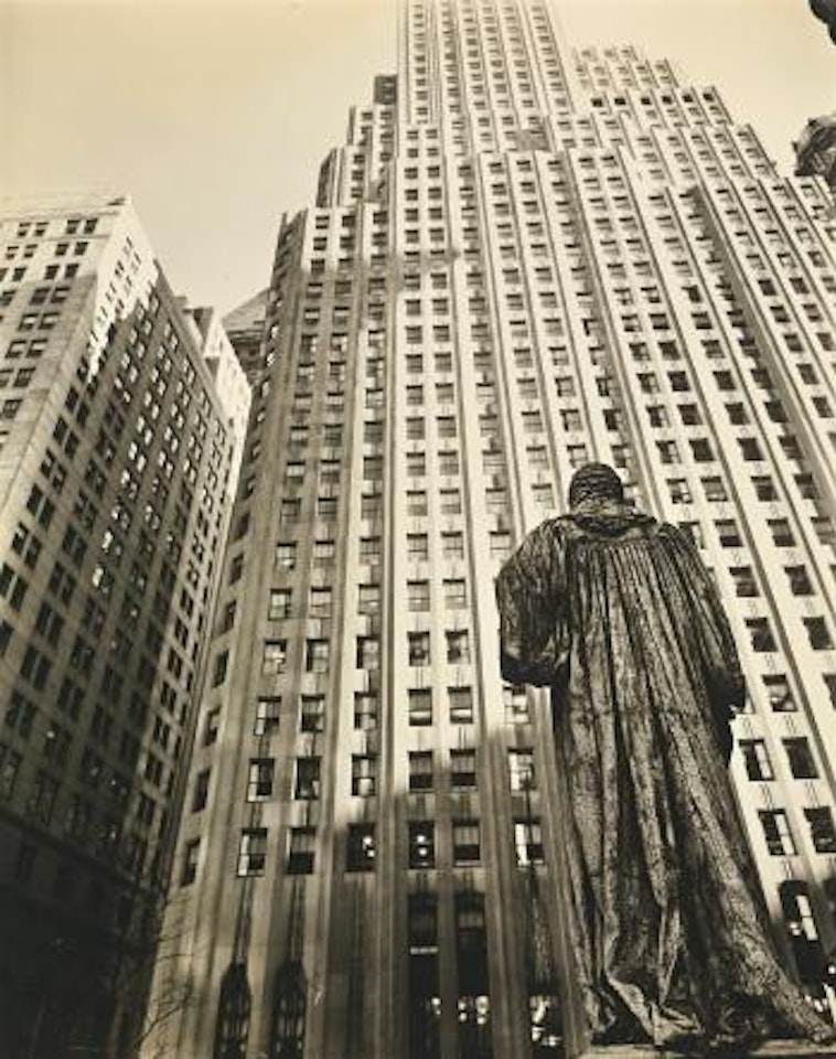 John Watts Statue: from Trinity Courtyard, looking toward one Wall Street by Berenice Abbott