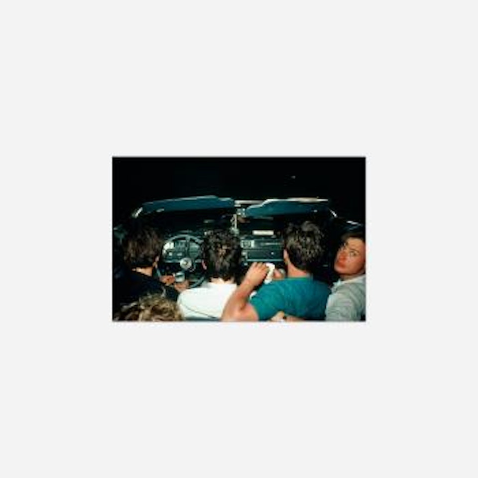 Four boys in the convertible at the drive-in, NJ by Nan Goldin