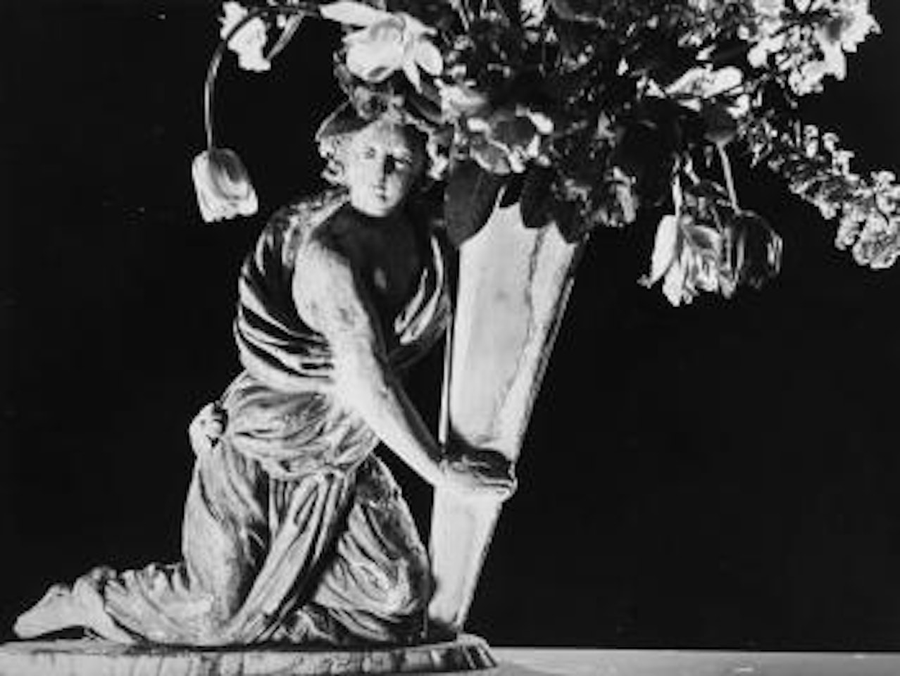 Untitled (Statue and Bouquet) by Man Ray
