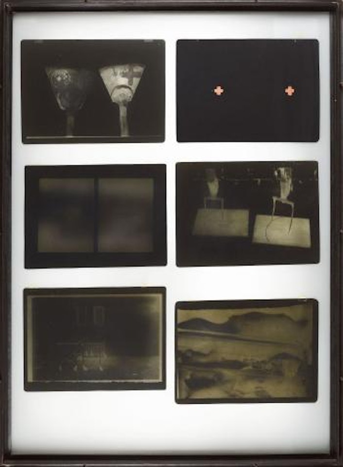 Photo negatives, one with two holes and brown color (brown cross), glass and frosted glass by Joseph Beuys
