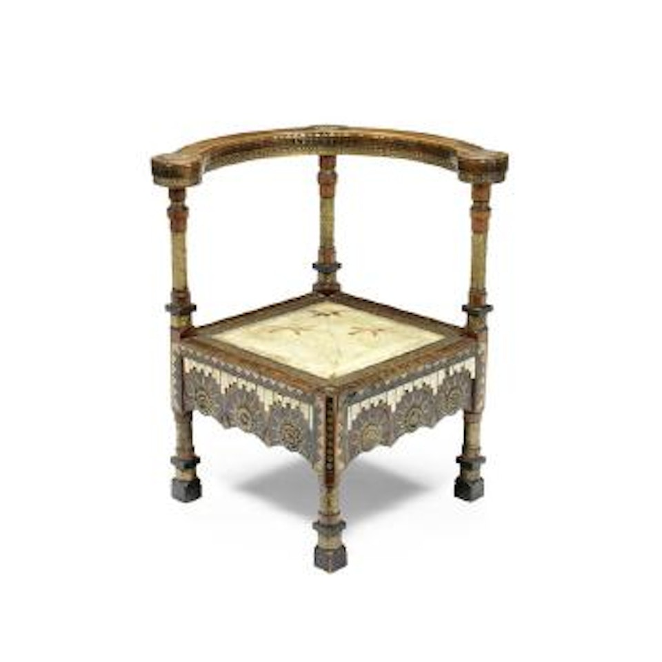 A Corner Armchair by Carlo Bugatti