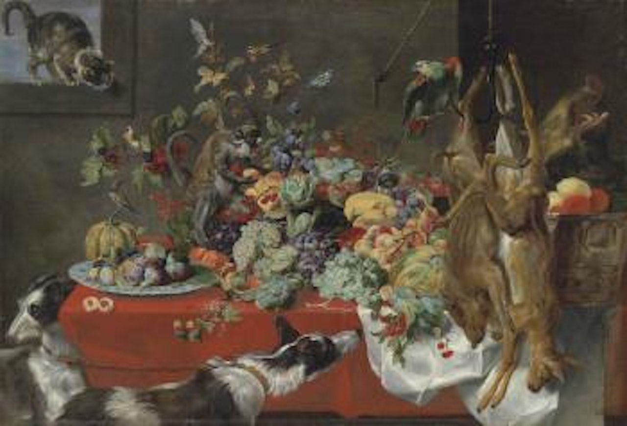 A draped table laden with Fruit, Nuts and Berries, with a Cat, Birds, a Parrot, a Squirrel, a Monkey, Hounds, a Boar's head and a buck and a fawn hanging from a hook by Frans Snyders