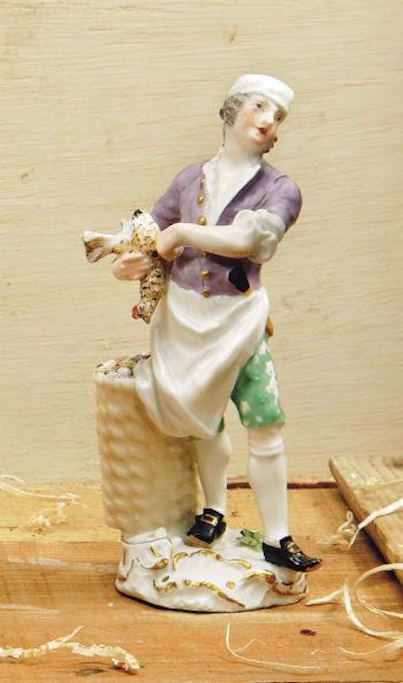 Figure of a poultry-plucker from the 'Cris de Paris series' by Peter Reinicke