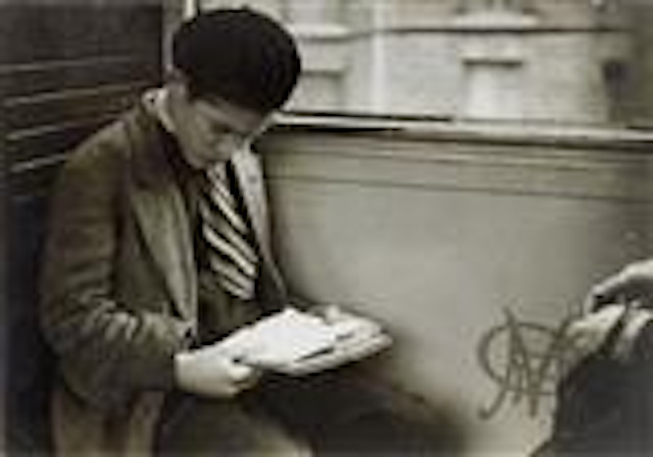 Reading by André Kertész