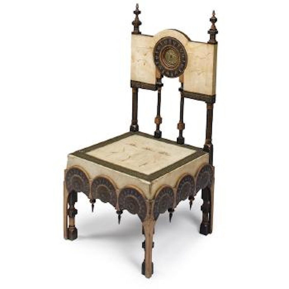 A side chair by Carlo Bugatti